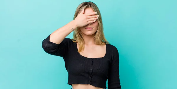 Young Pretty Blonde Woman Covering Eyes One Hand Feeling Scared — Stock Photo, Image