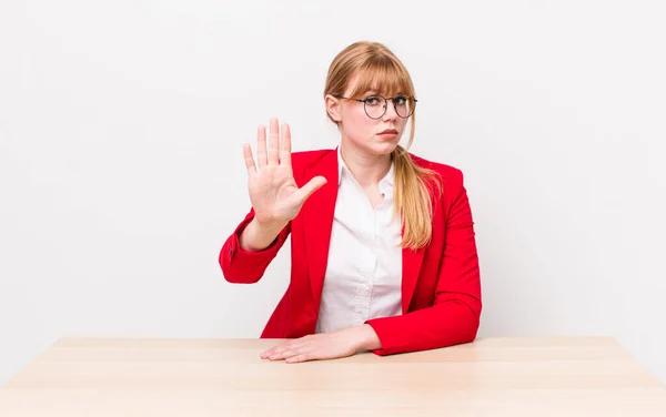 Red Head Pretty Woman Looking Serious Showing Open Palm Making — ストック写真