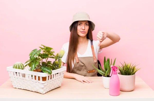 Hispanic Pretty Woman Feeling Cross Showing Thumbs Plants Gardering Concept — Stockfoto