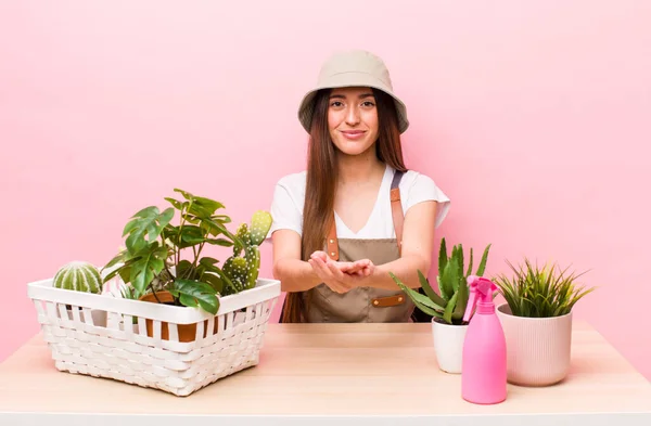 Hispanic Pretty Woman Smiling Happily Friendly Offering Showing Concept Plants — Stock Photo, Image