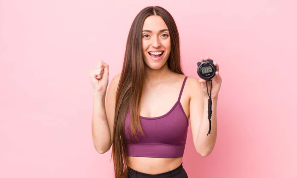 Hispanic Pretty Woman Feeling Shocked Laughing Celebrating Success Fitness Stopwatch — ストック写真
