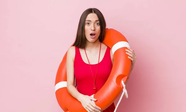Hispanic Pretty Woman Looking Very Shocked Surprised Lifeguard Concept — Stock Photo, Image