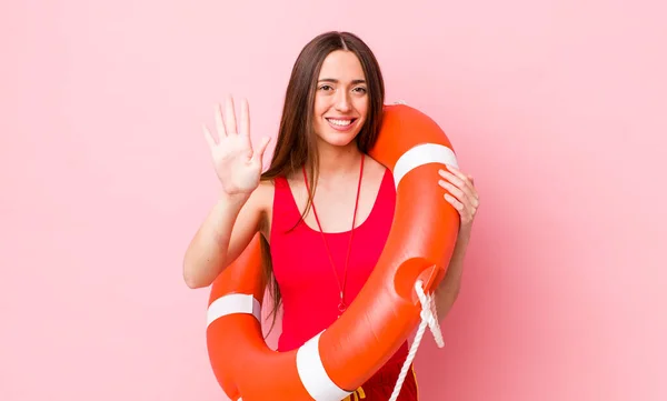Hispanic Pretty Woman Smiling Looking Friendly Showing Number Five Lifeguard — Stock Photo, Image