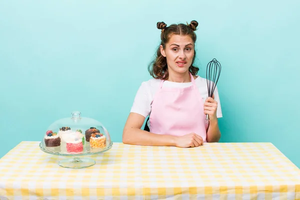 Young Pretty Woman Looking Puzzled Confused Home Made Cakes Concept — Stock Fotó