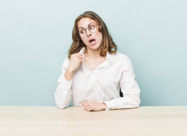 young pretty woman  feeling stressed, anxious, tired and frustrated. desk and business concept