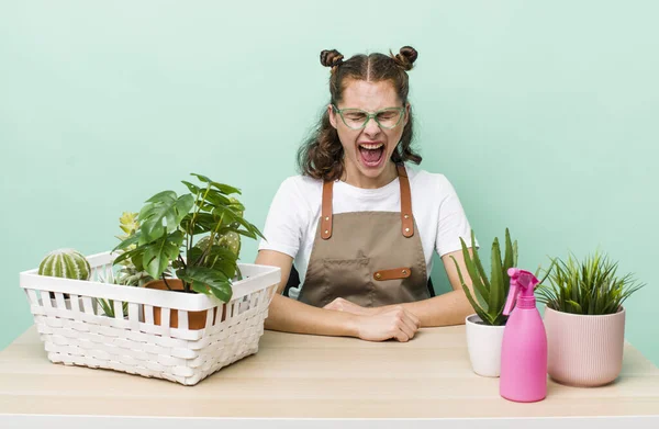 Young Pretty Woman Shouting Aggressively Looking Very Angry Gardering Plants — Foto de Stock