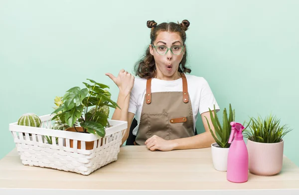 Young Pretty Woman Looking Astonished Disbelief Gardering Plants Concept — Foto de Stock