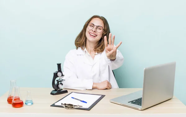 Young Pretty Woman Smiling Looking Friendly Showing Number Four Scientist — Stok fotoğraf