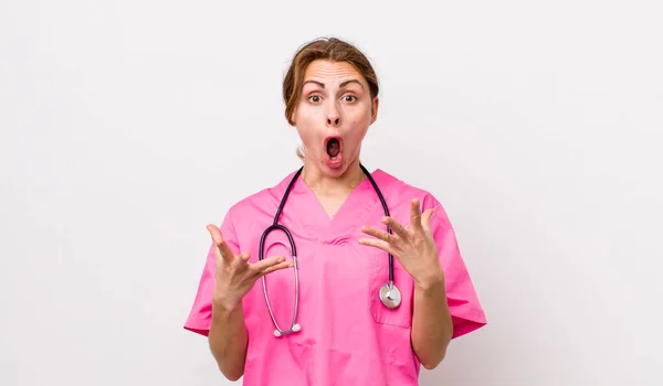 Young Pretty Woman Feeling Extremely Shocked Surprised Veterinarian Concept — Fotografia de Stock