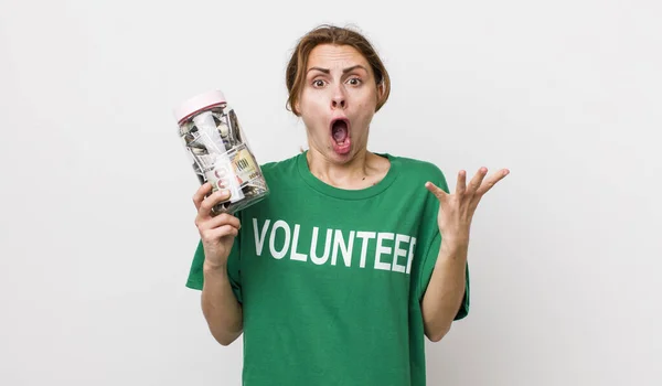 Young Pretty Woman Feeling Extremely Shocked Surprised Volunteer Concept — Stockfoto