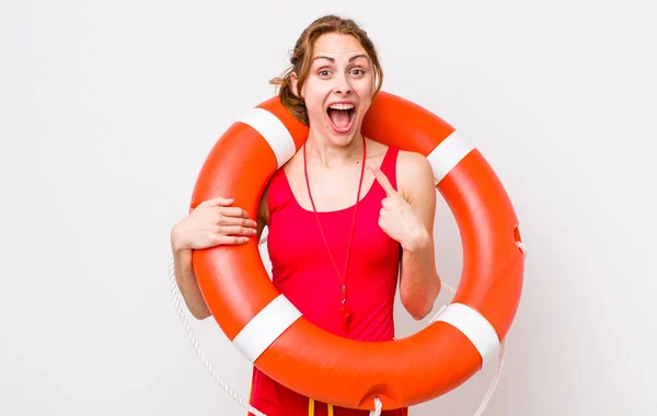 Young Pretty Woman Looking Excited Surprised Pointing Side Lifeguard Concept — Stock Photo, Image