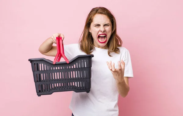 Young Pretty Woman Looking Angry Annoyed Frustrated Empty Shopping Basket — Stockfoto