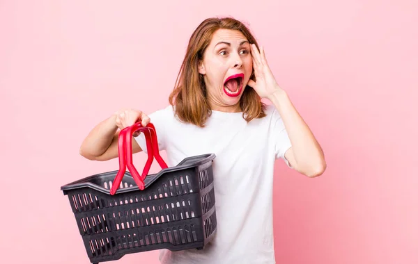 Young Pretty Woman Feeling Happy Excited Surprised Empty Shopping Basket — Stockfoto