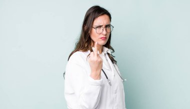 young pretty woman  feeling angry, annoyed, rebellious and aggressive. physician concept