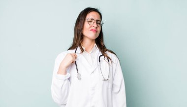 young pretty woman  looking arrogant, successful, positive and proud. physician concept