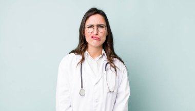 young pretty woman  feeling sad and whiney with an unhappy look and crying. physician concept