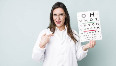 young pretty woman  feeling happy and pointing to self with an excited. optical vision test concept