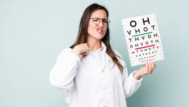 young pretty woman  feeling stressed, anxious, tired and frustrated. optical vision test concept
