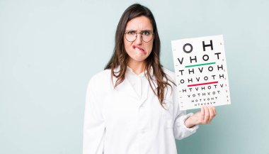 young pretty woman  looking puzzled and confused. optical vision test concept