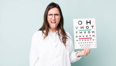 young pretty woman  feeling disgusted and irritated and tongue out. optical vision test concept
