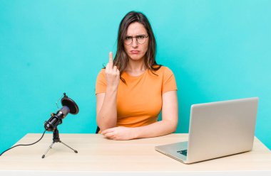 young pretty woman  feeling angry, annoyed, rebellious and aggressive. influencer concept