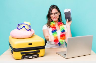 young pretty woman  smiling happily with friendly and  offering and showing a concept. summer travel concept