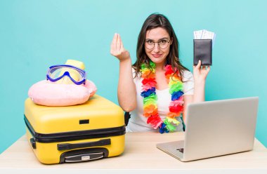 young pretty woman  making capice or money gesture, telling you to pay. summer travel concept