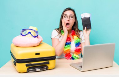 young pretty woman  feeling shocked and scared. summer travel concept