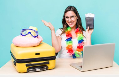 young pretty woman  feeling happy, surprised realizing a solution or idea. summer travel concept