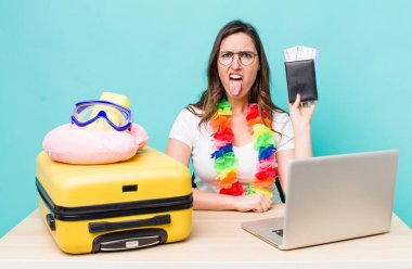 young pretty woman  feeling disgusted and irritated and tongue out. summer travel concept