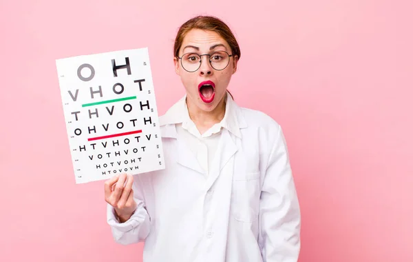 Young Pretty Woman Looking Very Shocked Surprised Optical Vision Test — Foto de Stock