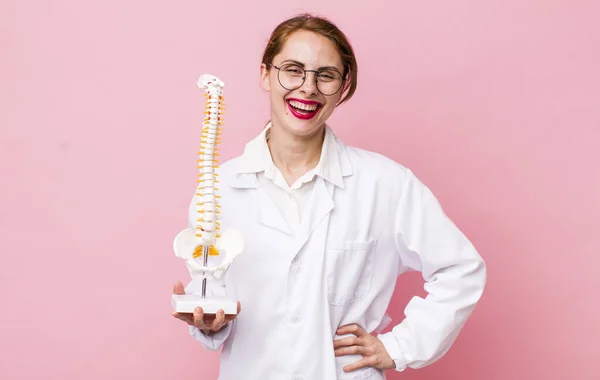 Young Pretty Woman Smiling Happily Hand Hip Confident Spine Specialist — Stock Fotó