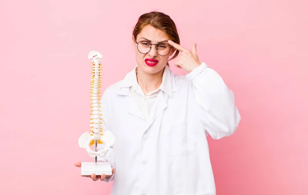Young Pretty Woman Feeling Confused Puzzled Showing You Insane Spine — Stockfoto