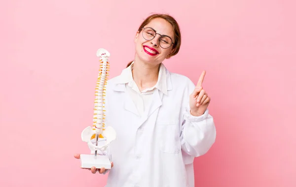 Young Pretty Woman Smiling Looking Friendly Showing Number One Spine — Stockfoto