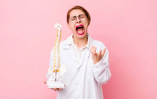 Young Pretty Woman Looking Desperate Frustrated Stressed Spine Specialist Concept — Stock Fotó