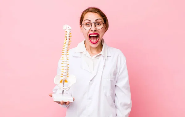 Young Pretty Woman Looking Happy Pleasantly Surprised Spine Specialist Concept — Stock Fotó