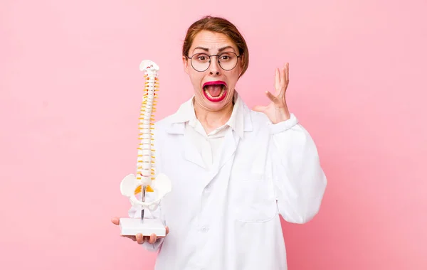 Young Pretty Woman Screaming Hands Air Spine Specialist Concept — Stockfoto