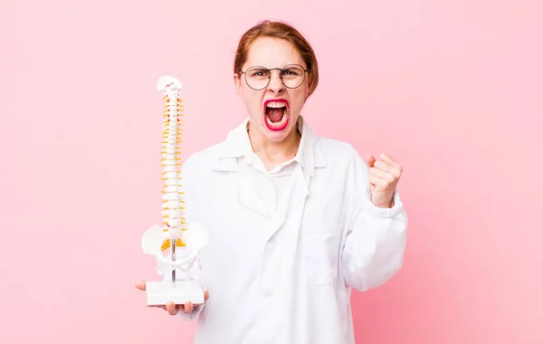 Young Pretty Woman Shouting Aggressively Angry Expression Spine Specialist Concept — Stock Fotó