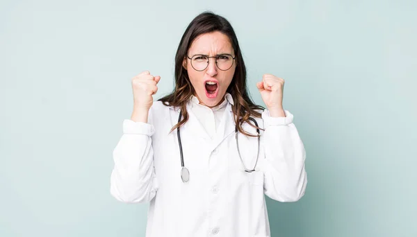 Young Pretty Woman Shouting Aggressively Angry Expression Physician Concept — Zdjęcie stockowe