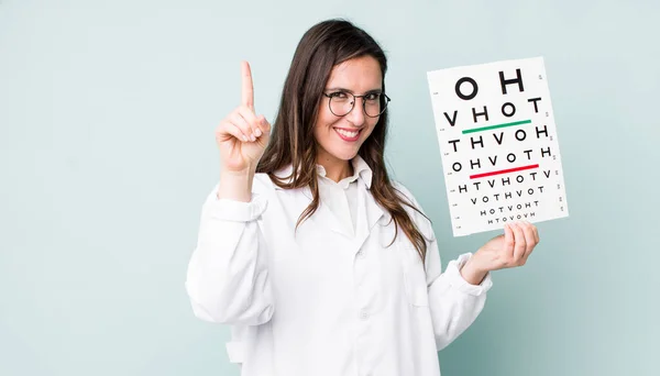 Young Pretty Woman Smiling Proudly Confidently Making Number One Optical — Stok fotoğraf