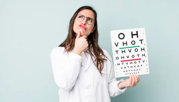 Young Pretty Woman Thinking Feeling Doubtful Confused Optical Vision Test — Stockfoto