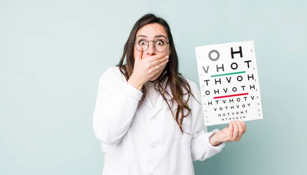 Young Pretty Woman Covering Mouth Hands Shocked Optical Vision Test — Zdjęcie stockowe