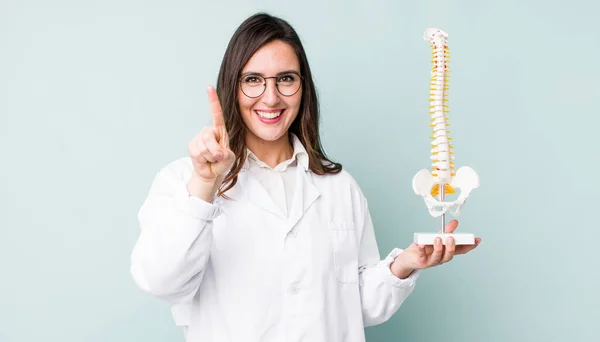 Young Pretty Woman Smiling Looking Friendly Showing Number One Spine — Stockfoto