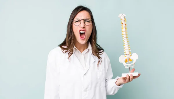 Young Pretty Woman Shouting Aggressively Looking Very Angry Spine Specialist —  Fotos de Stock