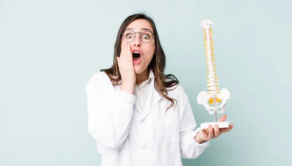 Young Pretty Woman Feeling Shocked Scared Spine Specialist Concept —  Fotos de Stock