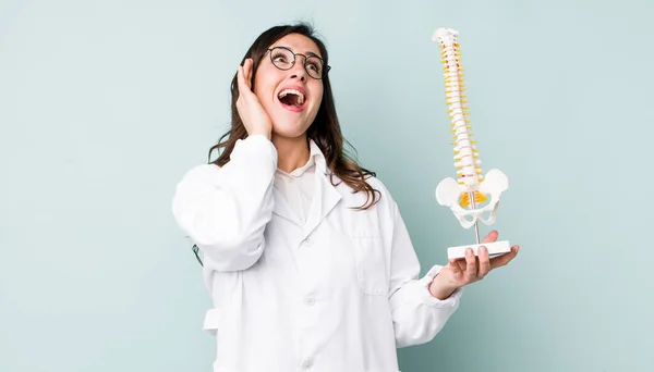 Young Pretty Woman Feeling Happy Excited Surprised Spine Specialist Concept — Stockfoto