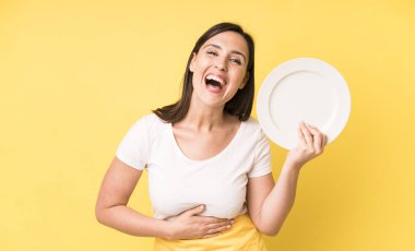 young adult pretty woman home chef with empty plate