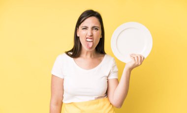 young adult pretty woman home chef with empty plate