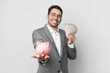 Genç, yakışıklı İspanyol adam tasarrufu ve iş konsepti