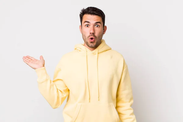 Young Handsome Hicpanic Man Looking Surprised Shocked Jaw Dropped Holding — Foto Stock